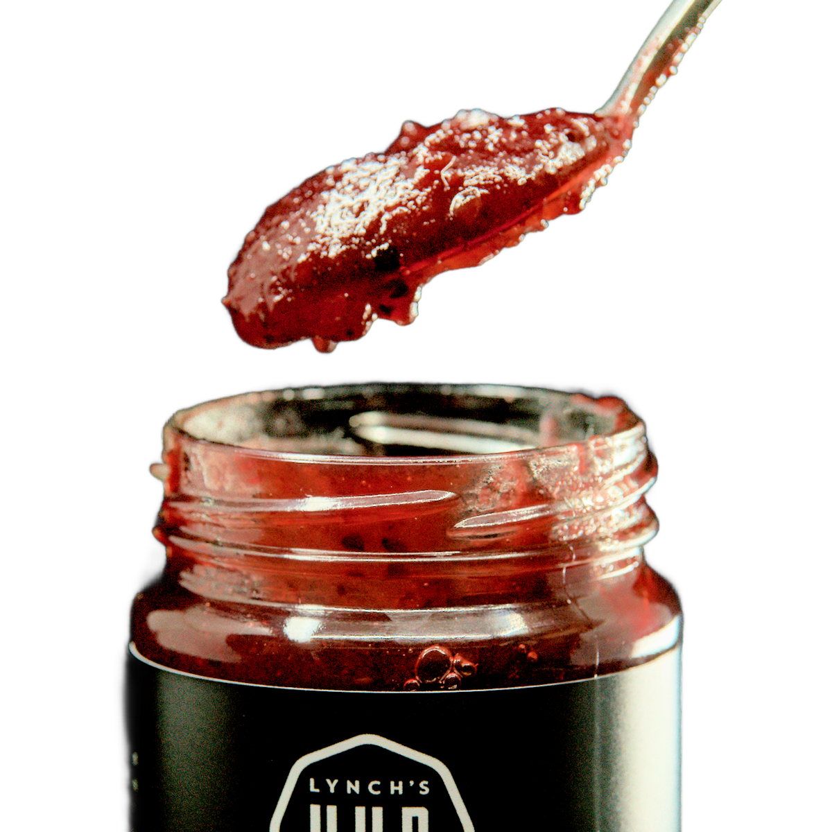 Close-up of Lynch’s Hub artisanal jam spooned from a jar – rich, handmade jam crafted in Newcastle, Australia with native ingredients, vegan and gluten free.